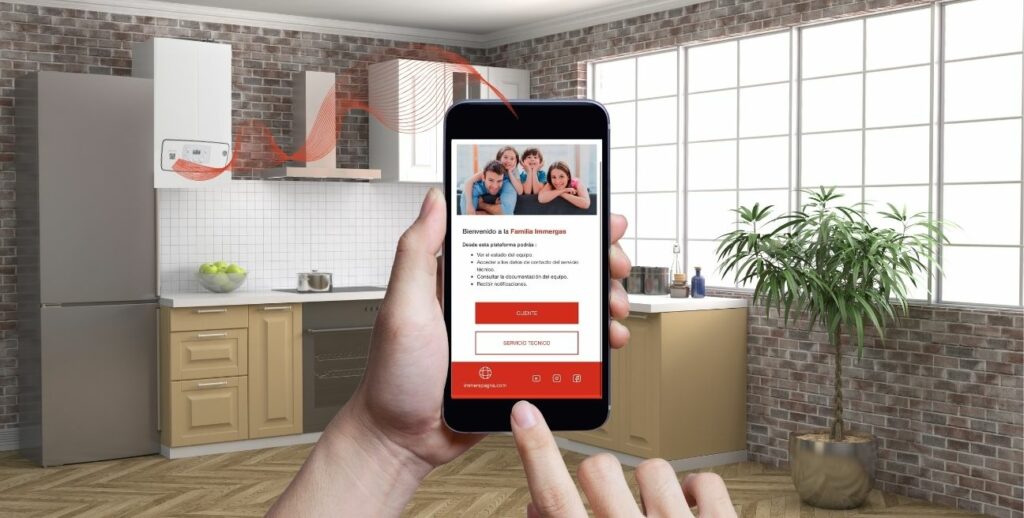 Imagen cocina con caldera Immergas con código QR y móvil con lector.